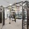 The fitness center at Urba Apartments in Ballston, Arlington, VA, featuring exercise machines and cardio equipment.